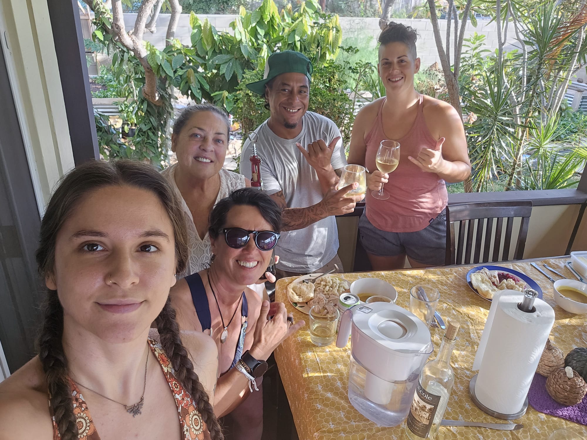 A table set for a holiday, and a family taking a picture